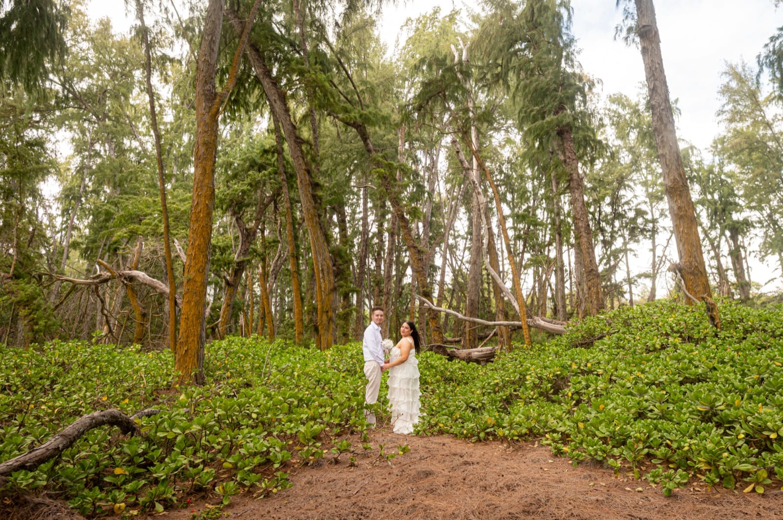 A couple under the trees at Waimanalo Beach