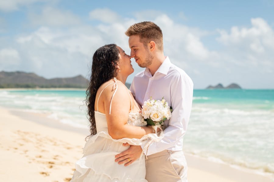 A couple on the beach at Waimanalo, the day of their Kualoa ceremony